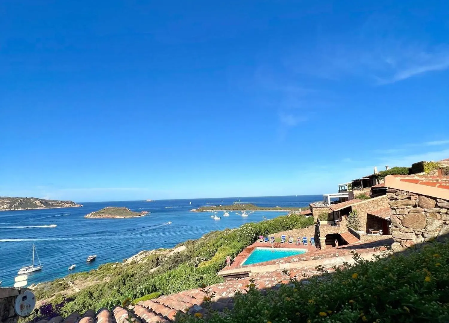Апартаменты Punta Est Trilocale Meravigliosa Vista Mare Капо-Кода-Кавальо Италия